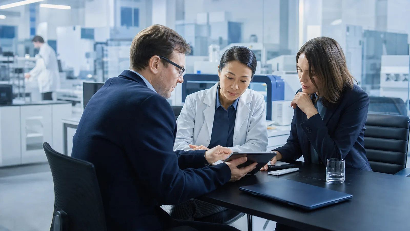 Laboratory commercial team reviewing a customer quotation and analytical service scope